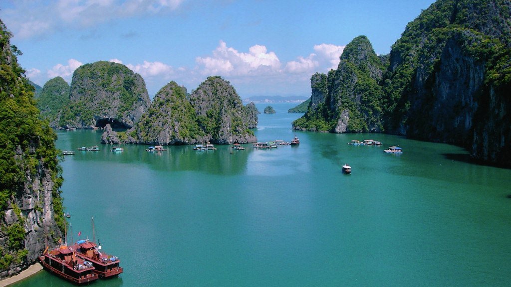 Limestone karst formations clustered across Ha Long Bay